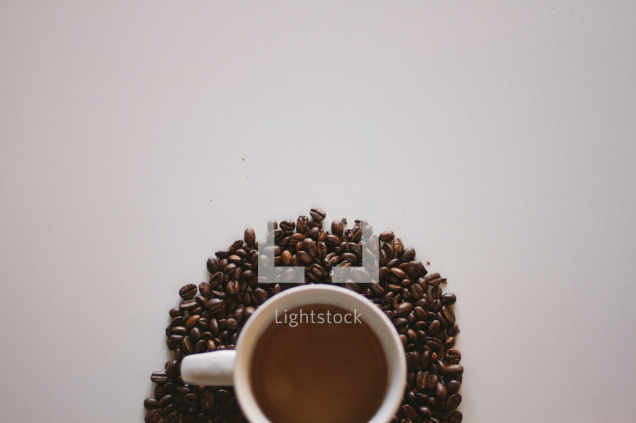 coffee mug and coffee beans 