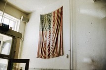 American flag hanging on a wall 