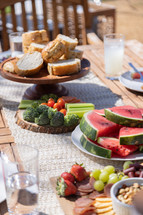 food on a picnic table outdoors 