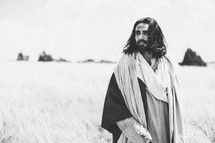 Jesus Christ walking in a field