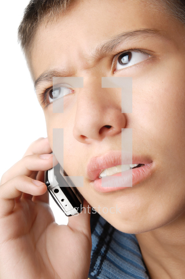 Boy with mobile phone trying to understand his talker