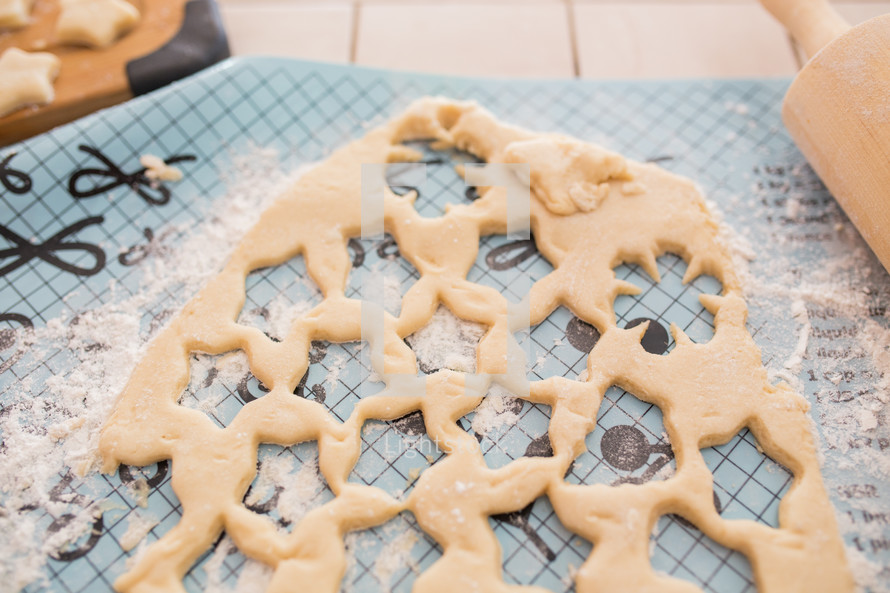 star shaped cookies cutout of dough 