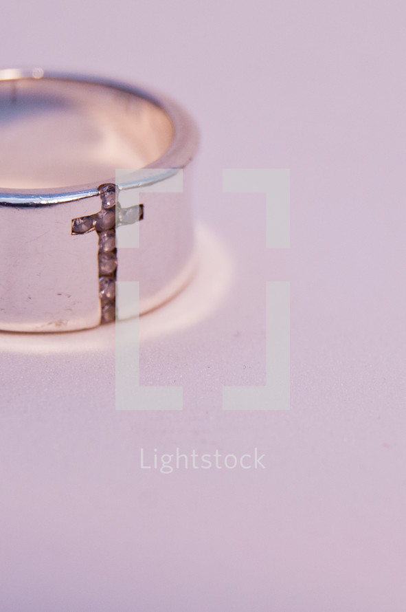 wedding band with a cross