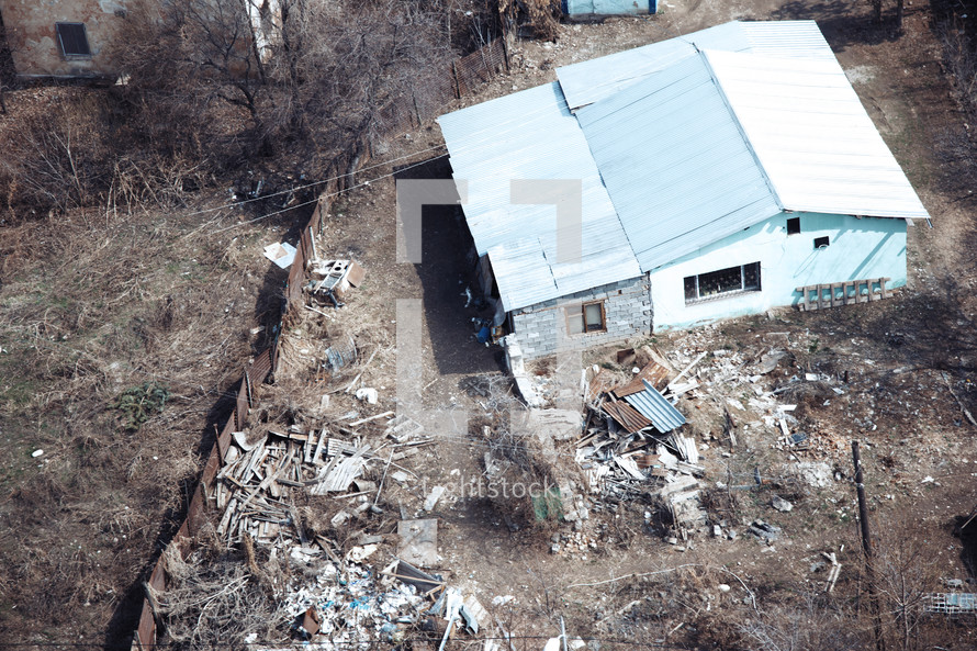 aerial view over a collapsing building 