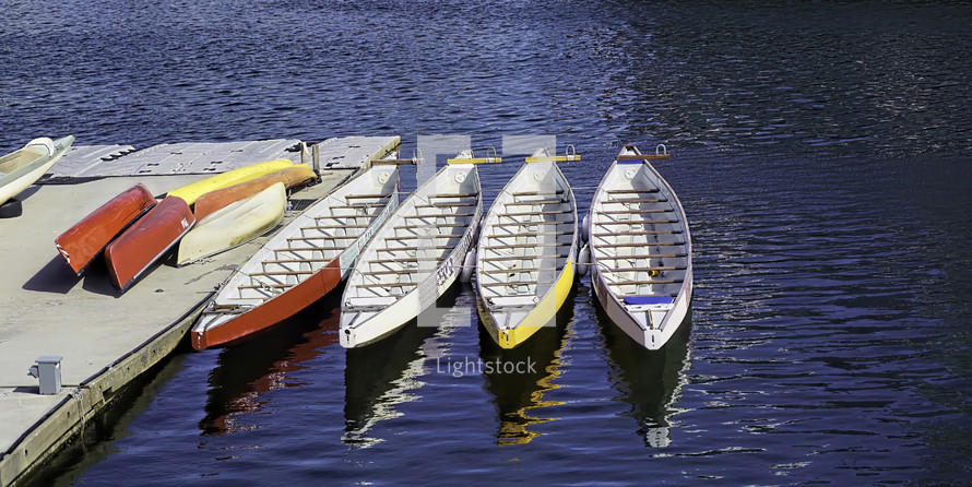 canoes at a dock