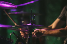 a man playing cymbals 