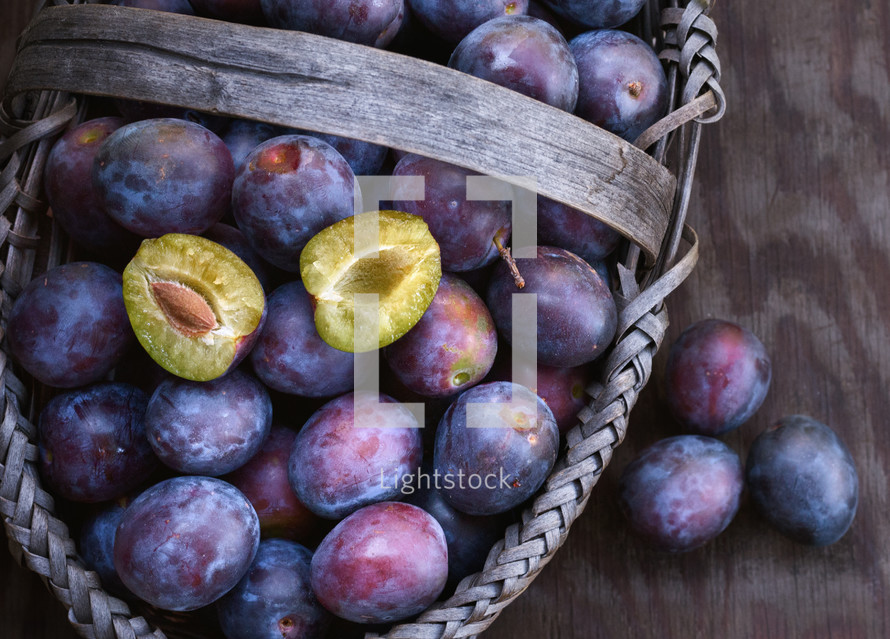 plums in a basket 