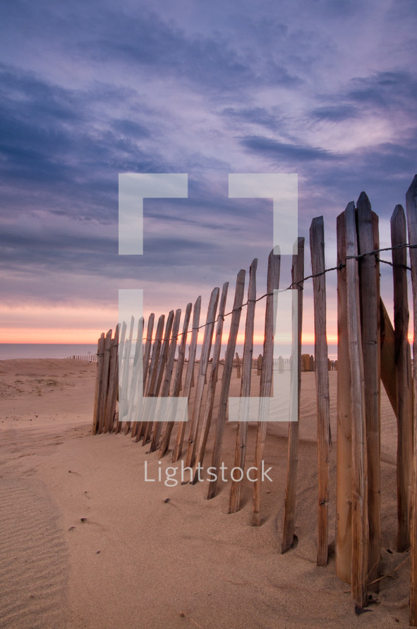 fence line on a beach