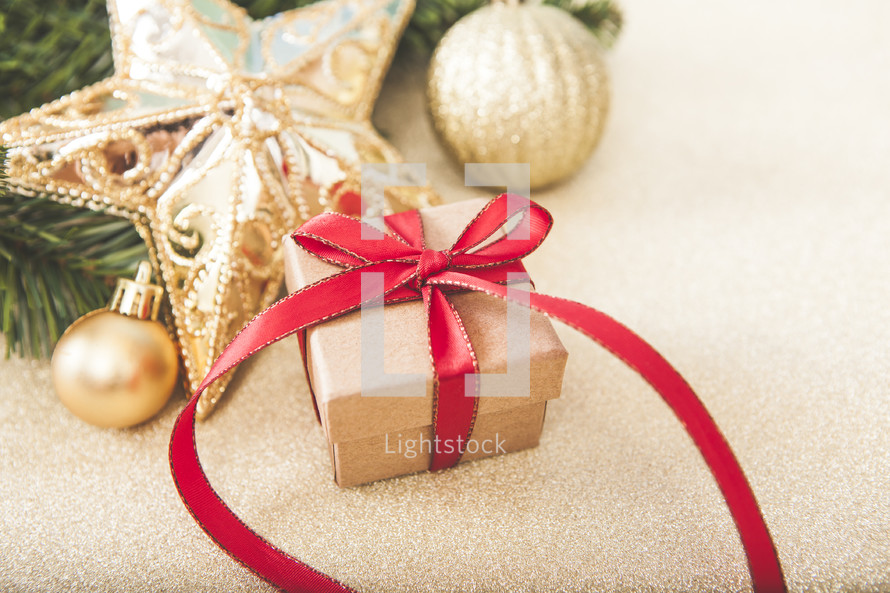 Christmas gift box with red ribbon 