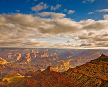 clouds in a blue sky above the Grand canyon 