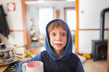 a child with a milk mustache 