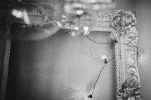 a vintage frame with lights in black and white