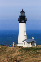tourists visiting a lighthouse 