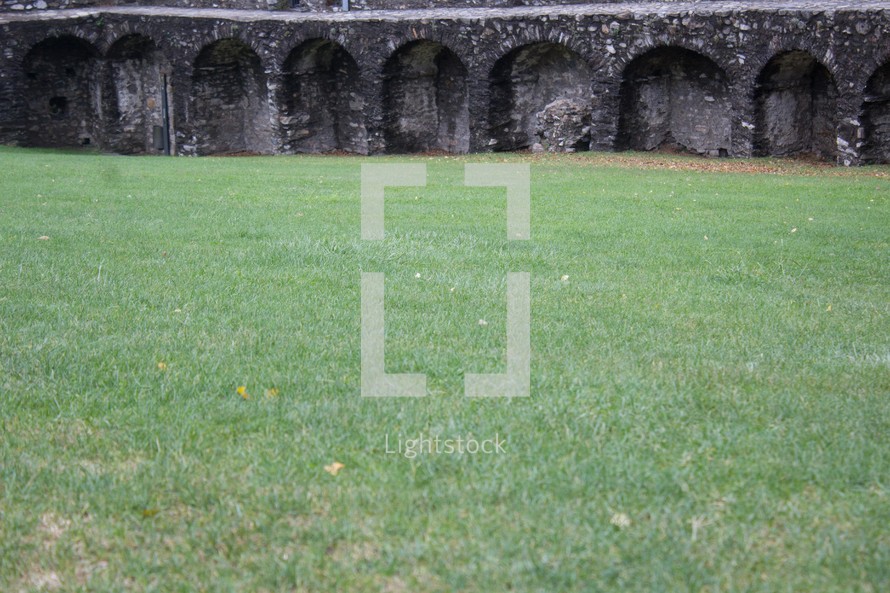 green grass and castle walls 