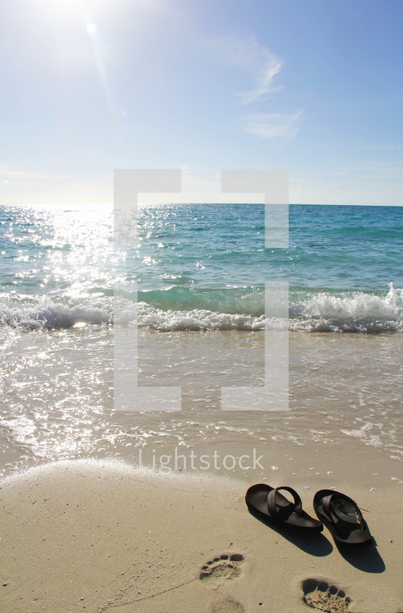 Flip flops on a beach 