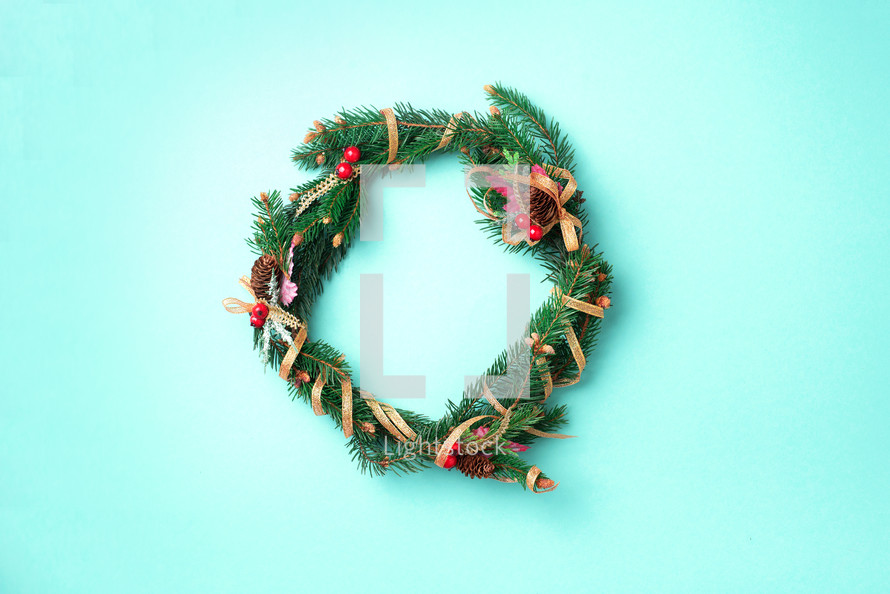Christmas wreath on a blue background