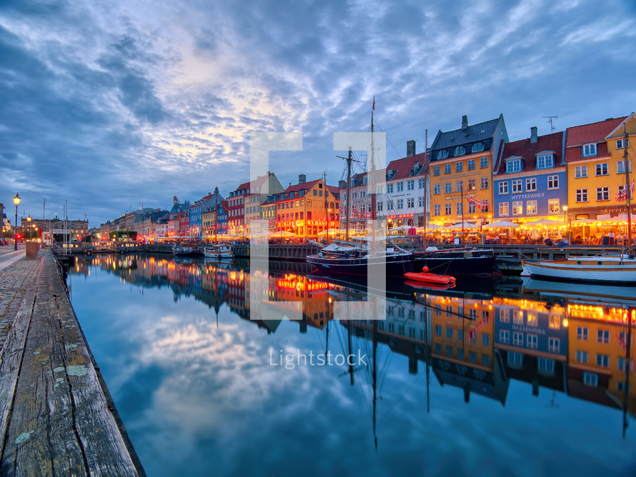 Nyhavn port in the center of Copenhagen, Denmark during summer night