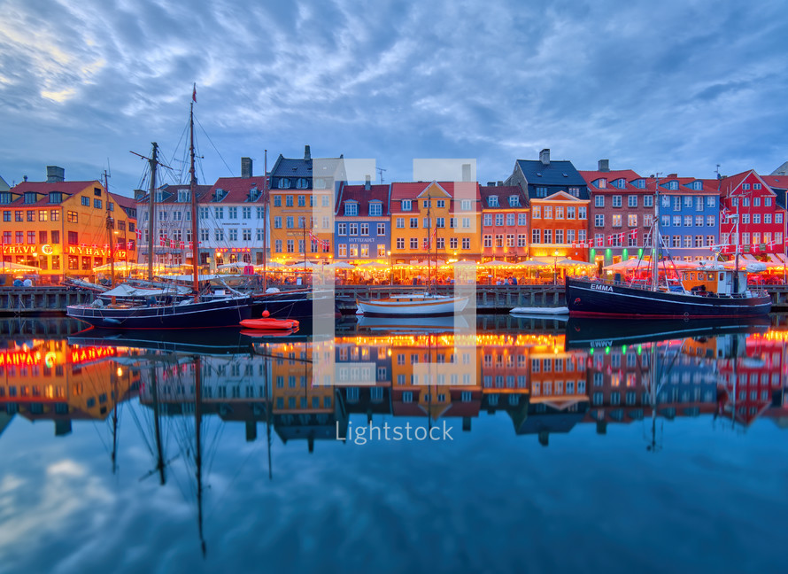 Famous old Nyhavn port in the center of Copenhagen, Denmark during summer night