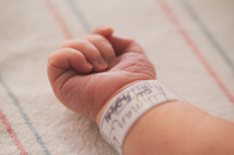 hospital wrist band on a newborn 