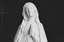 head of a statue of Mary praying