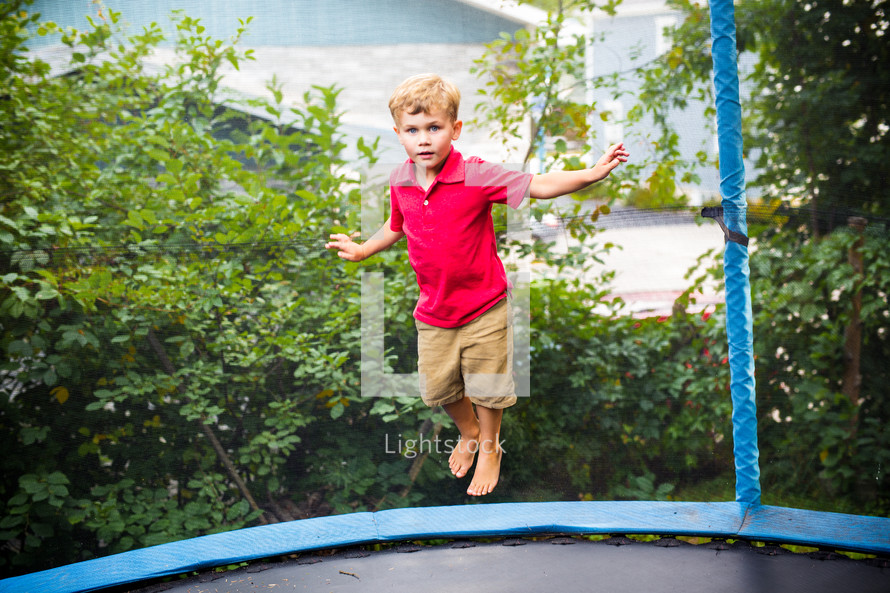 child on a trampoline 
