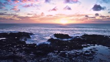 Power of nature Sunrise over ocean beach in rocky coast in New Zealand wild landscape
