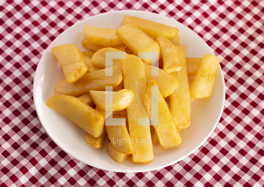 A Pile of Chunky Steak Fries Isolated on a Background