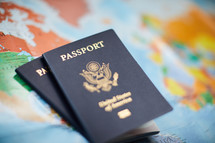 passports on a world map 