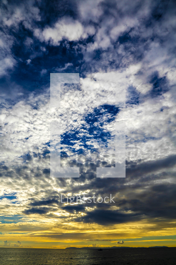 clouds and blue sky over the ocean 
