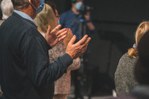 raised hands at a worship service 