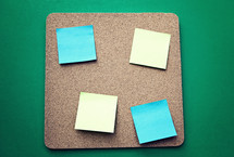 Sticky Notes with Copy Space on Cork Board Background