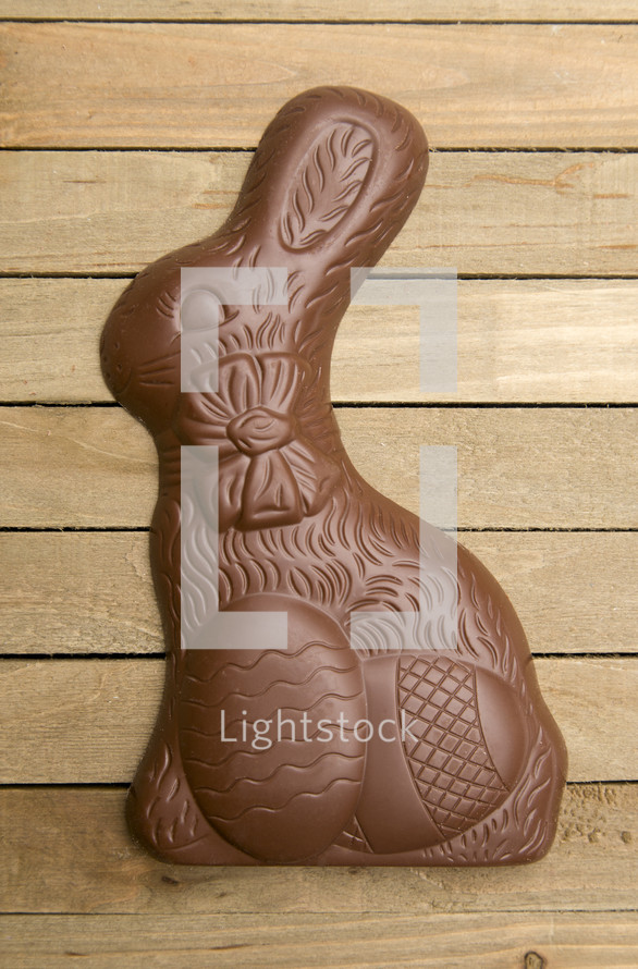 chocolate bunny on a wood background 