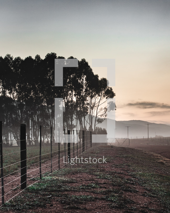 fence and farmland 