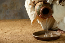 Jesus pouring water 
