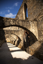old stone arches in an ancient building 