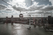 building cranes and sky cable cars in London