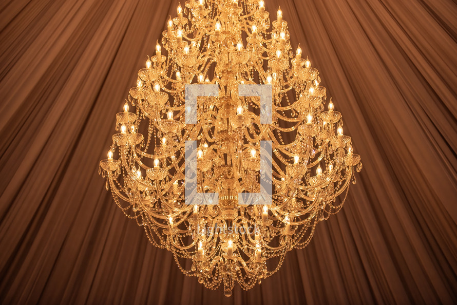 Huge crystal chandelier with fabric ceiling