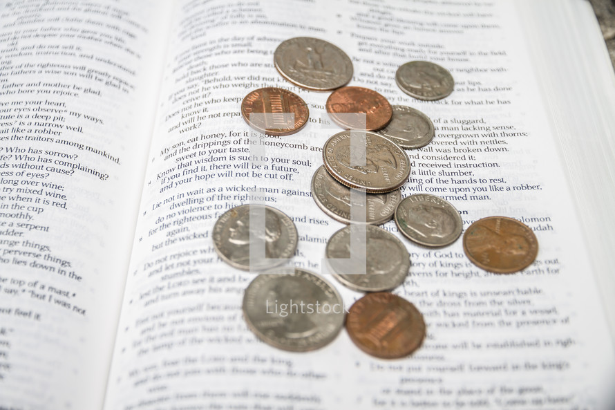 Money on an open Bible