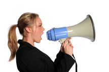 woman yelling into a megaphone 