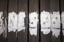 weathered white line painted on boards