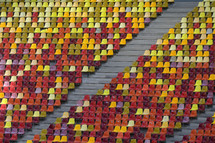 Colorful Rows Of Seats At Empty Open Air Stadium