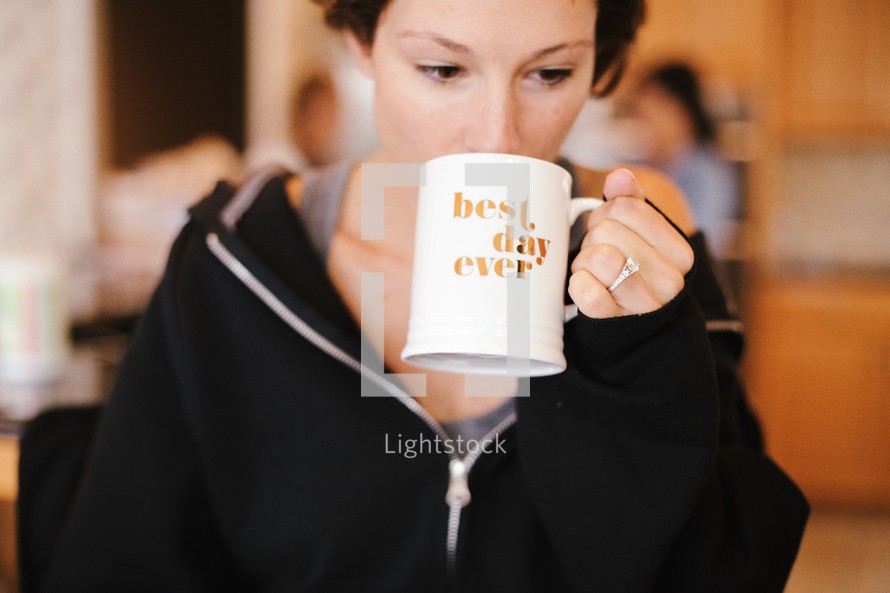 woman drinking out of a coffee mug, Best day ever 