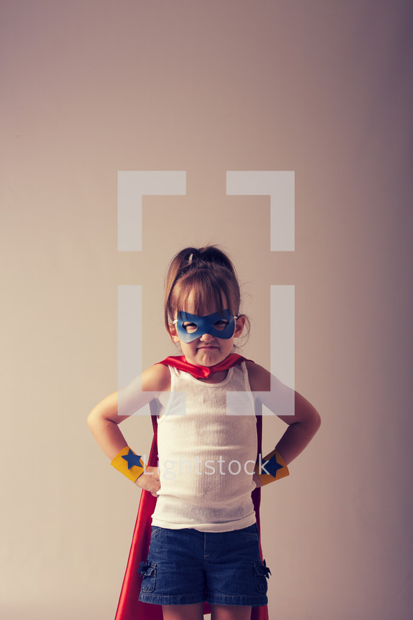 Girl in a superhero costume.