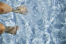 feet in pool water 