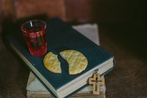 Communion elements on a Bible 