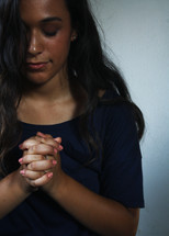 a praying girl 