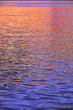 Closeup Colorful Abstract Sunrise Reflection On Danube River in Galati, Romania