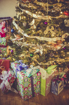Presents under a Christmas tree. 