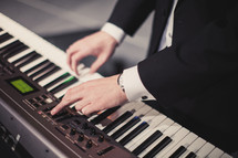 A man playing a keyboard 