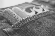 tools in a jeans pocket